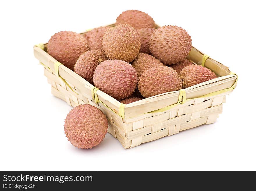 Litchi in the basket on white