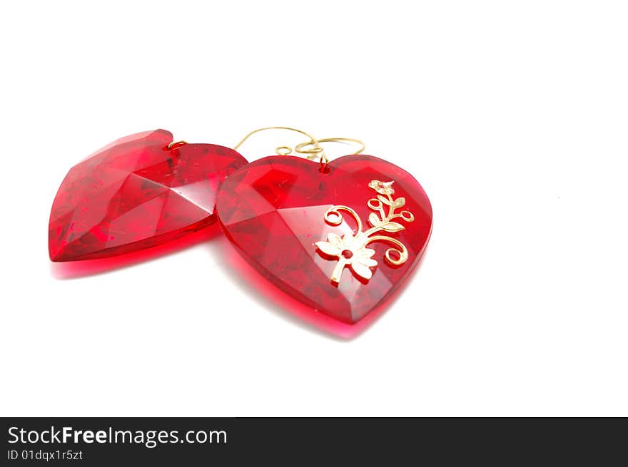 Two connected red glass hearts