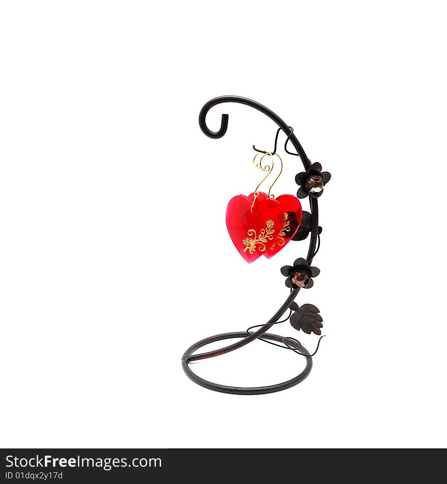 Two red glass hearts hanged