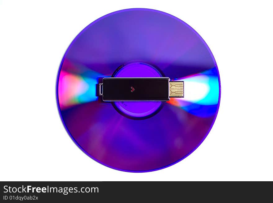 Shiny data storage for tasty content: DVD and flash USB drive isolated