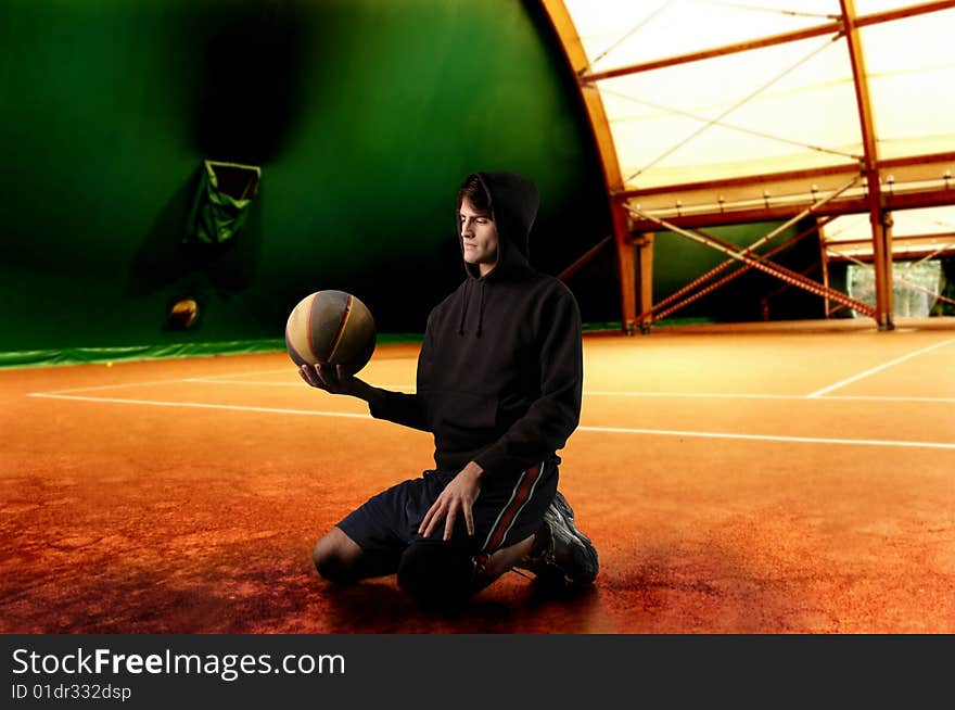 A basketball player in a gymnasium