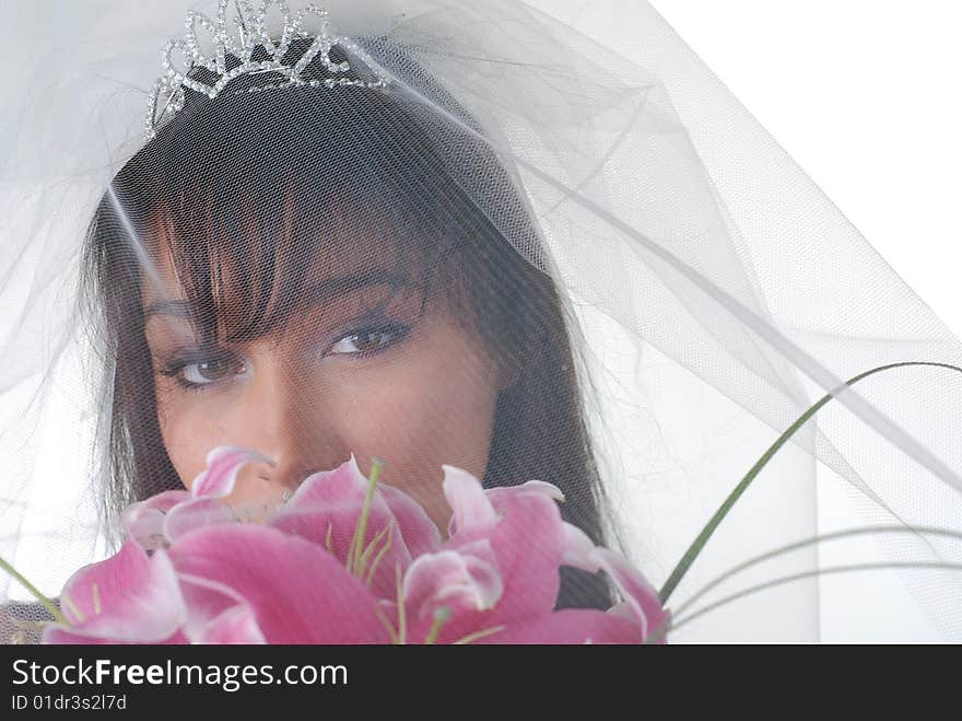 Portrait of young dark-hair bride with bouquet and tiara. Portrait of young dark-hair bride with bouquet and tiara