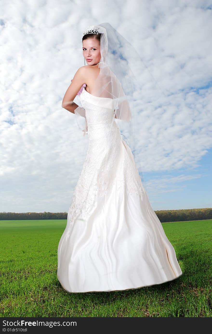 Young Bride And Cloudy Sky