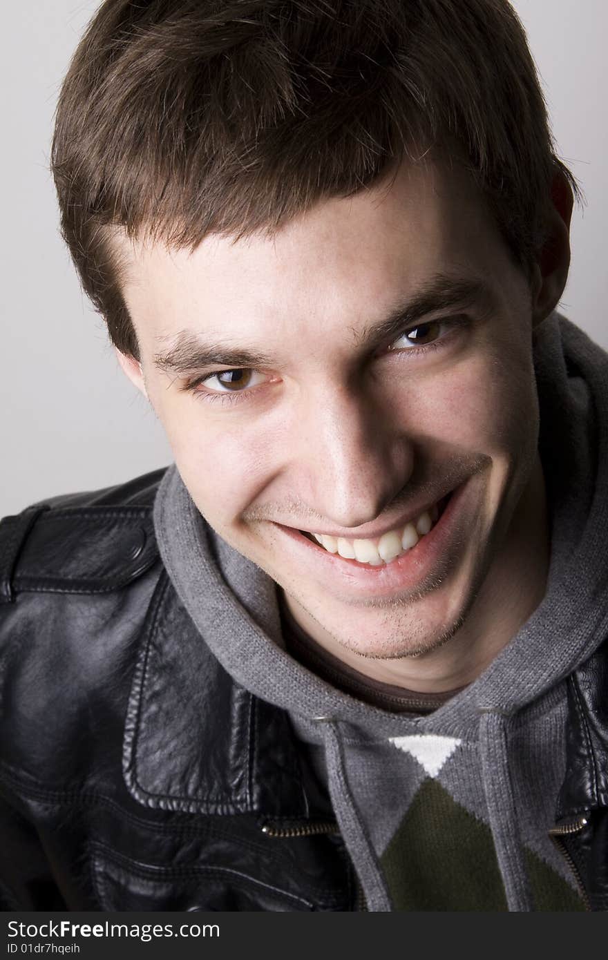 Portrait of a handsome young man smiling