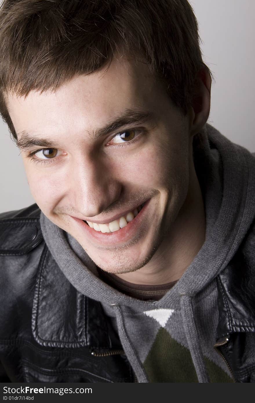 Portrait of a handsome young man smiling