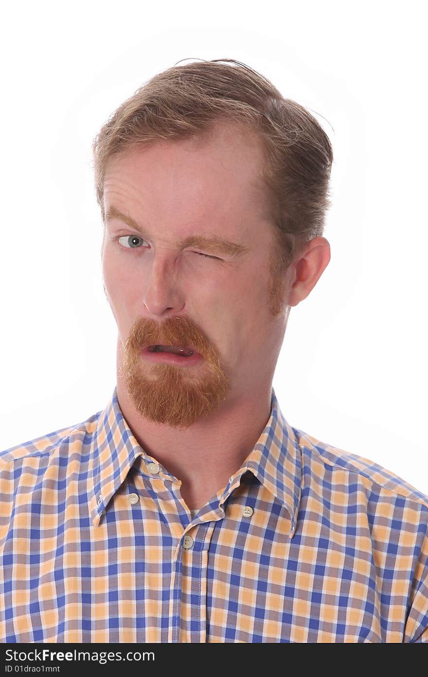 Portrait of winking man on white background