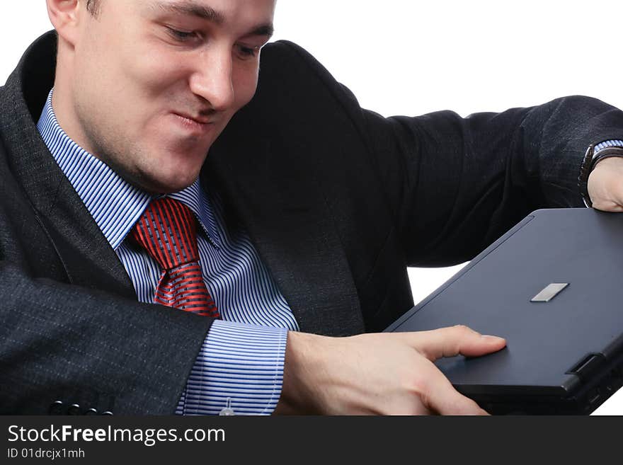 Businessman with the computer, isolated on a white background. Businessman with the computer, isolated on a white background