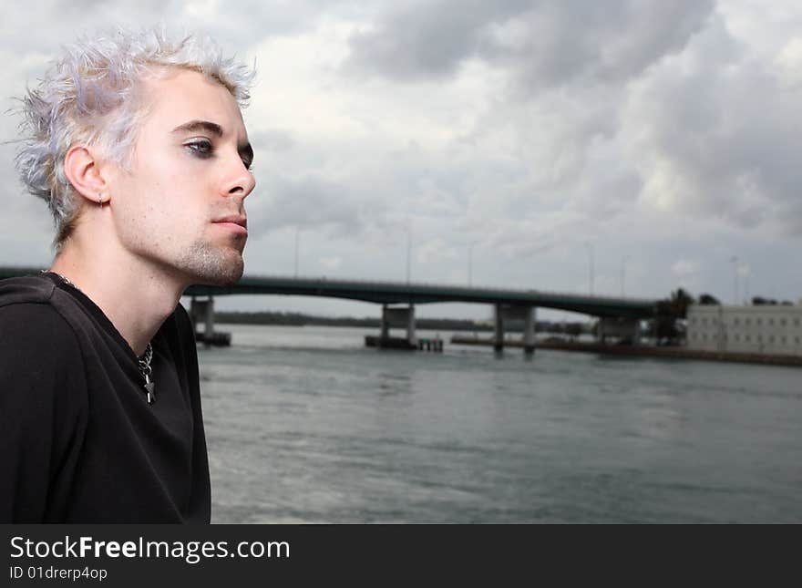 Young man looking away from the camera. Young man looking away from the camera