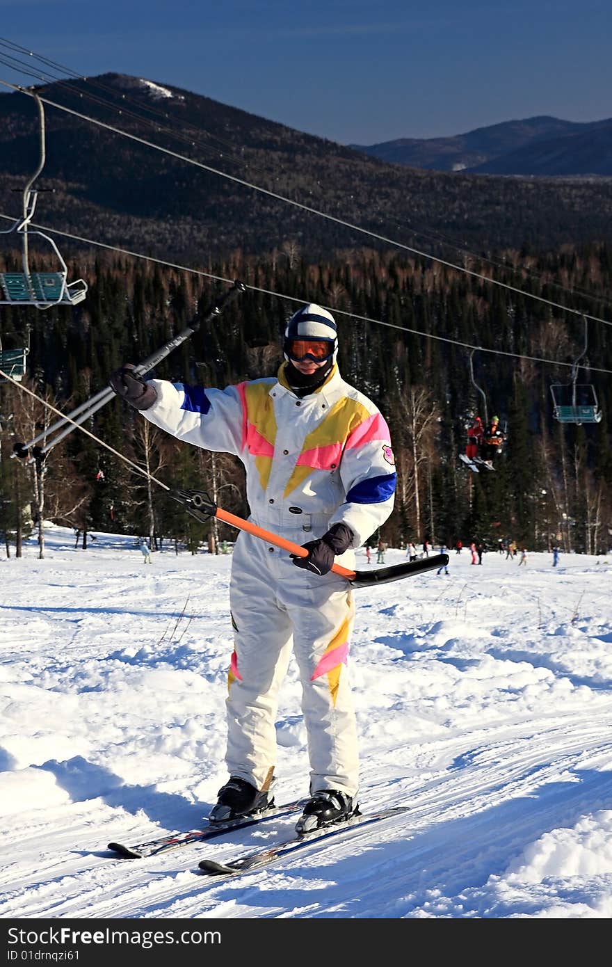 A Man Is A Mountain-skier.