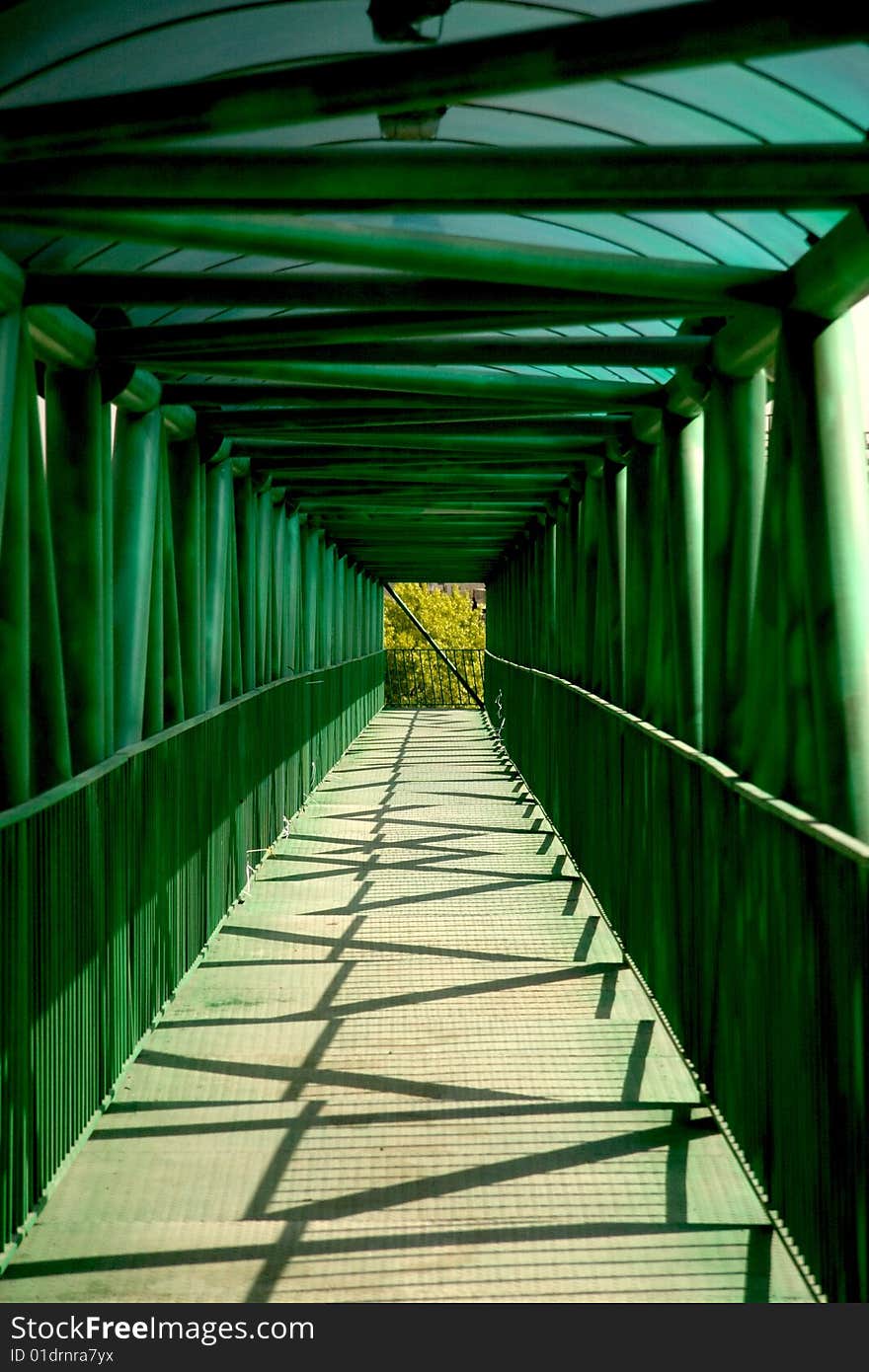 Perspective from a long highway passengers tunnel . Perspective from a long highway passengers tunnel .