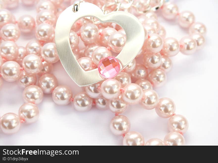 Necklace with heart and pink stone on it,pink pearls. Necklace with heart and pink stone on it,pink pearls.