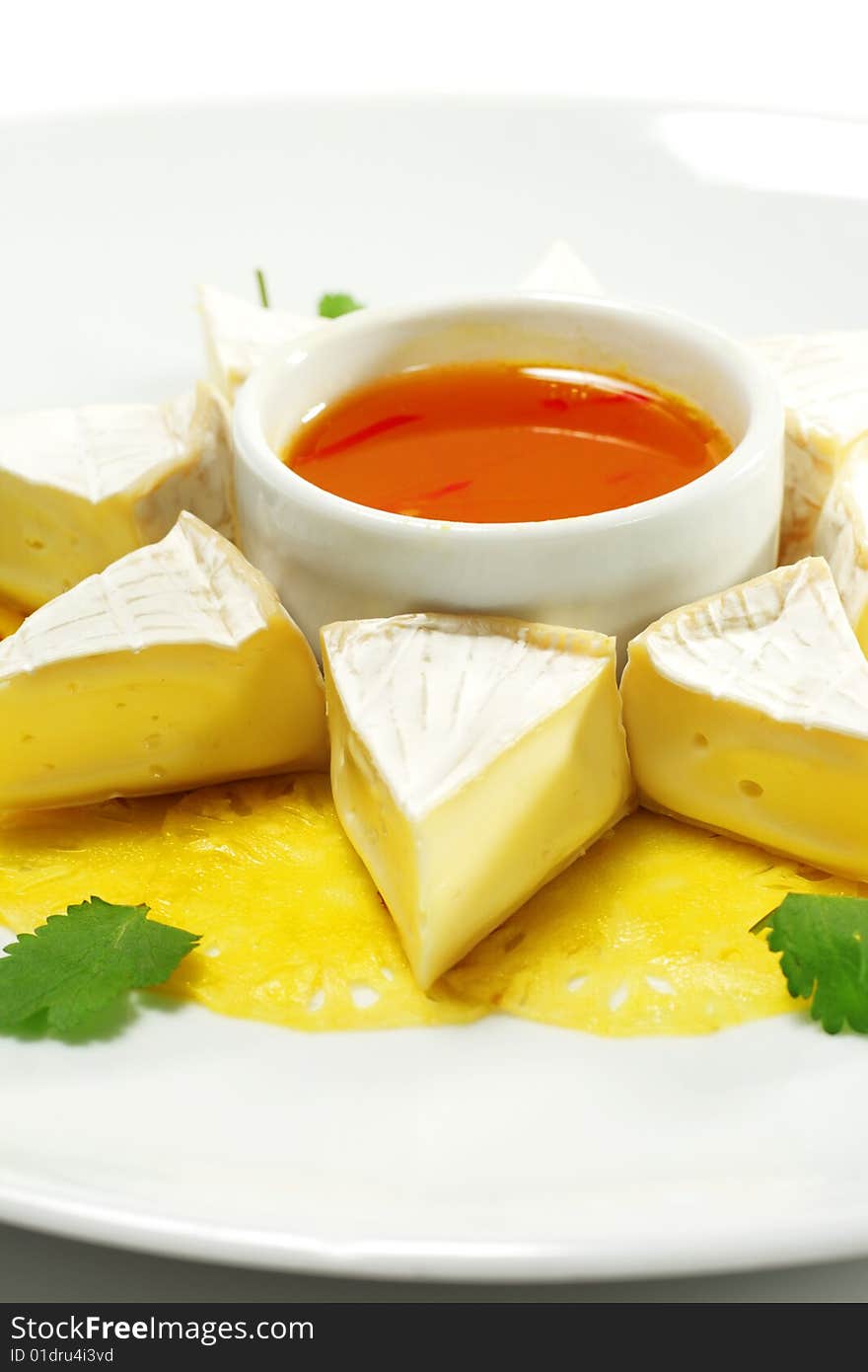 Fromage Cheese with Honey Orange Sauce