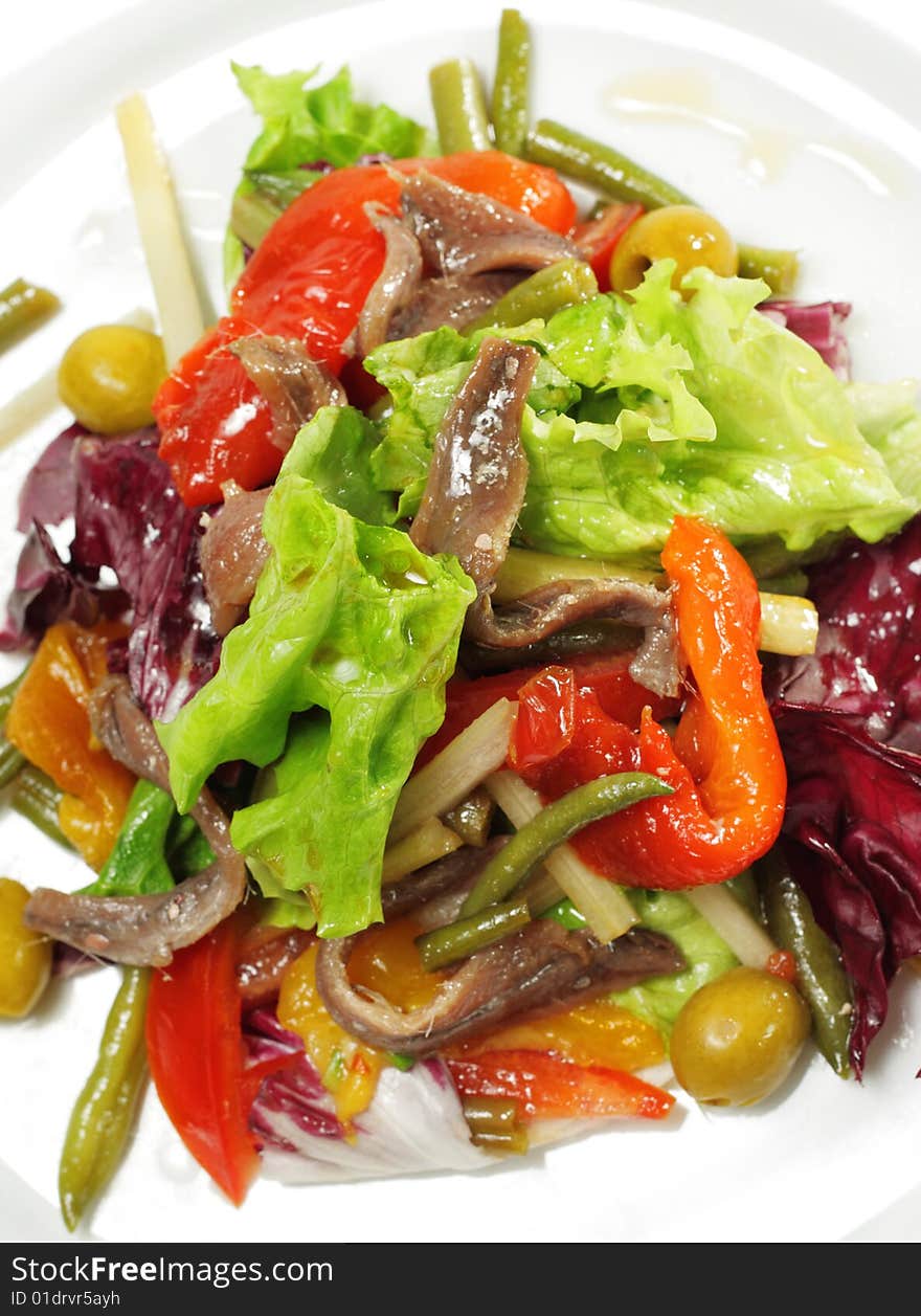 Salad with Anchovy, Olive and Vegetable Leaf