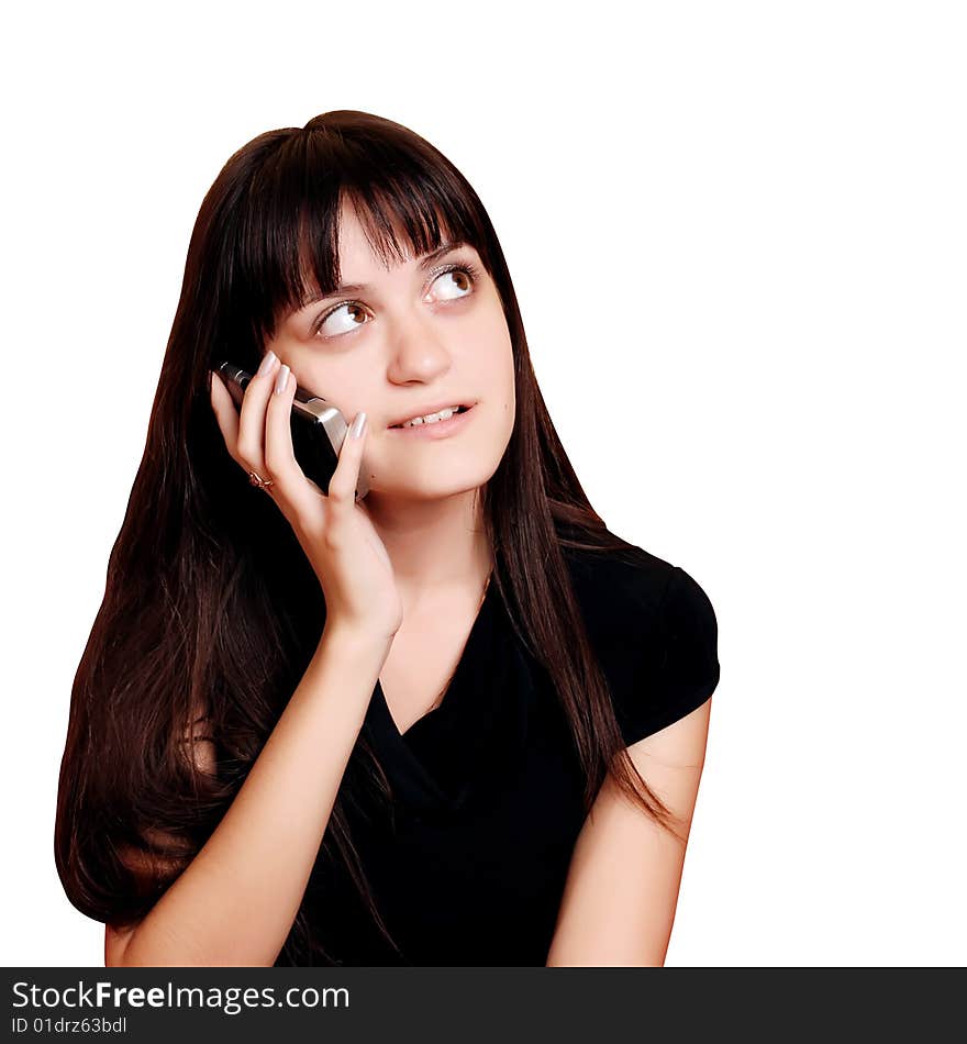 Beautiful girl talking on a mobile phone. Beautiful girl talking on a mobile phone