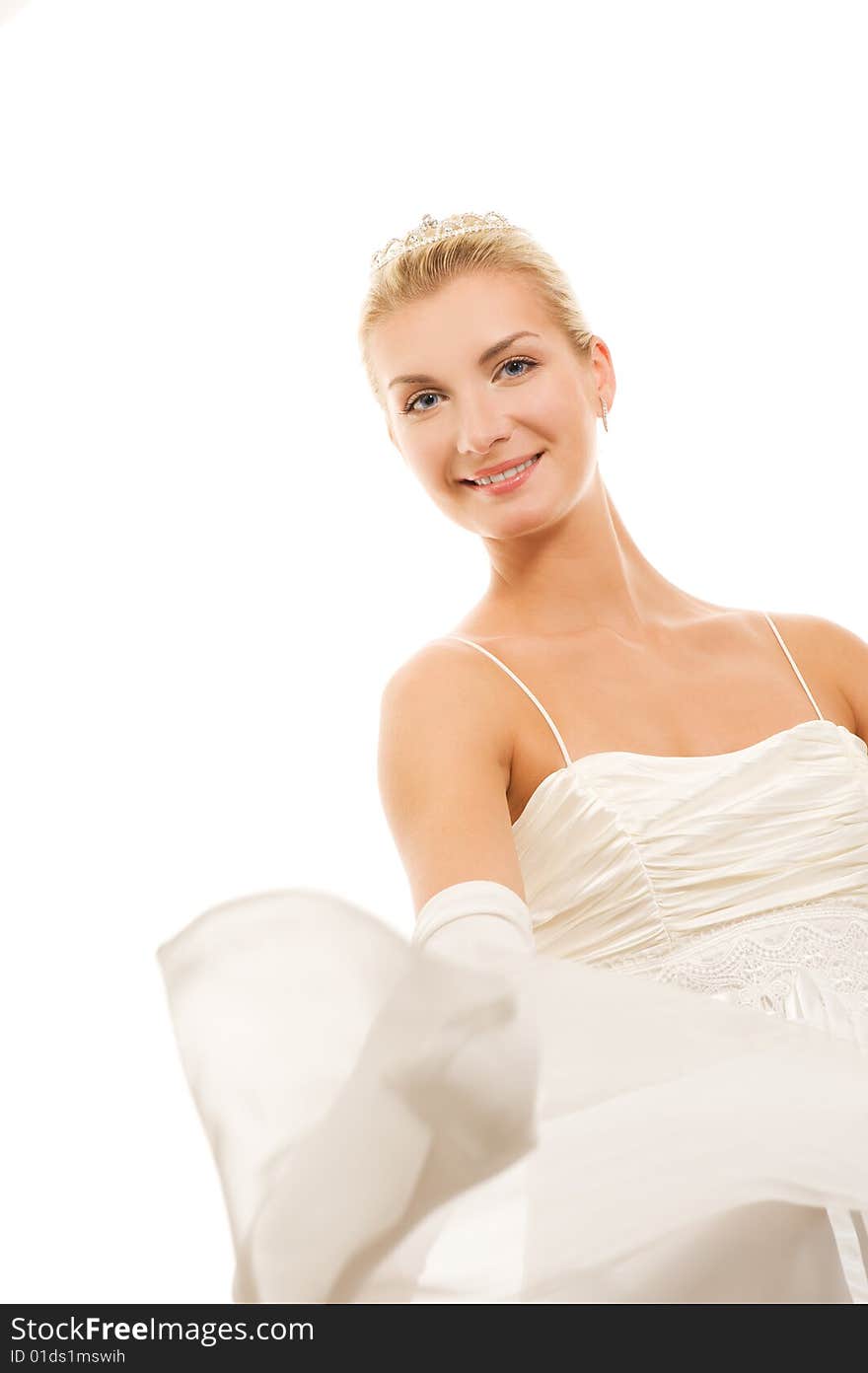 Beautiful bride dancing with veil