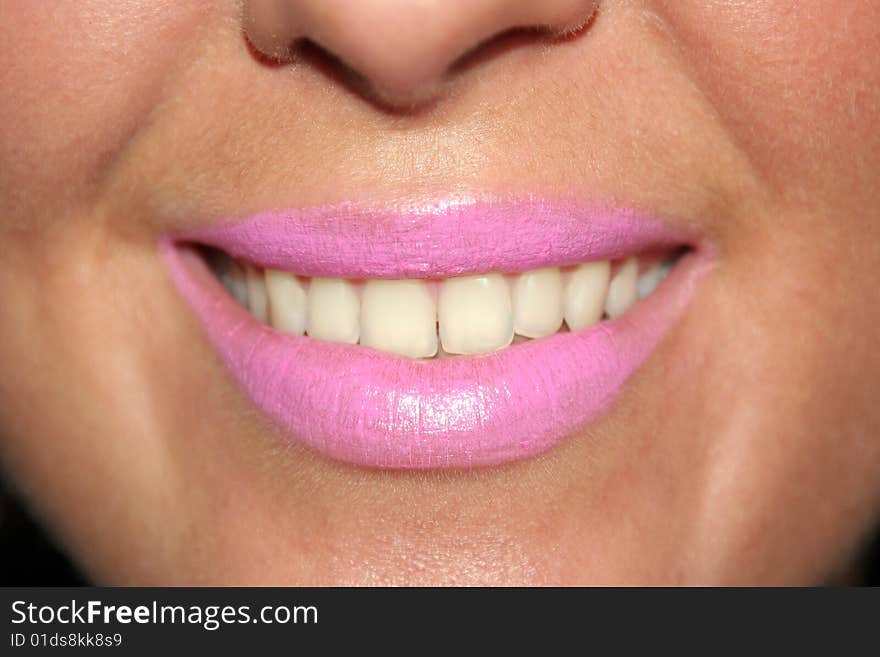 Close up of smiling womans mouth and teeth. Close up of smiling womans mouth and teeth