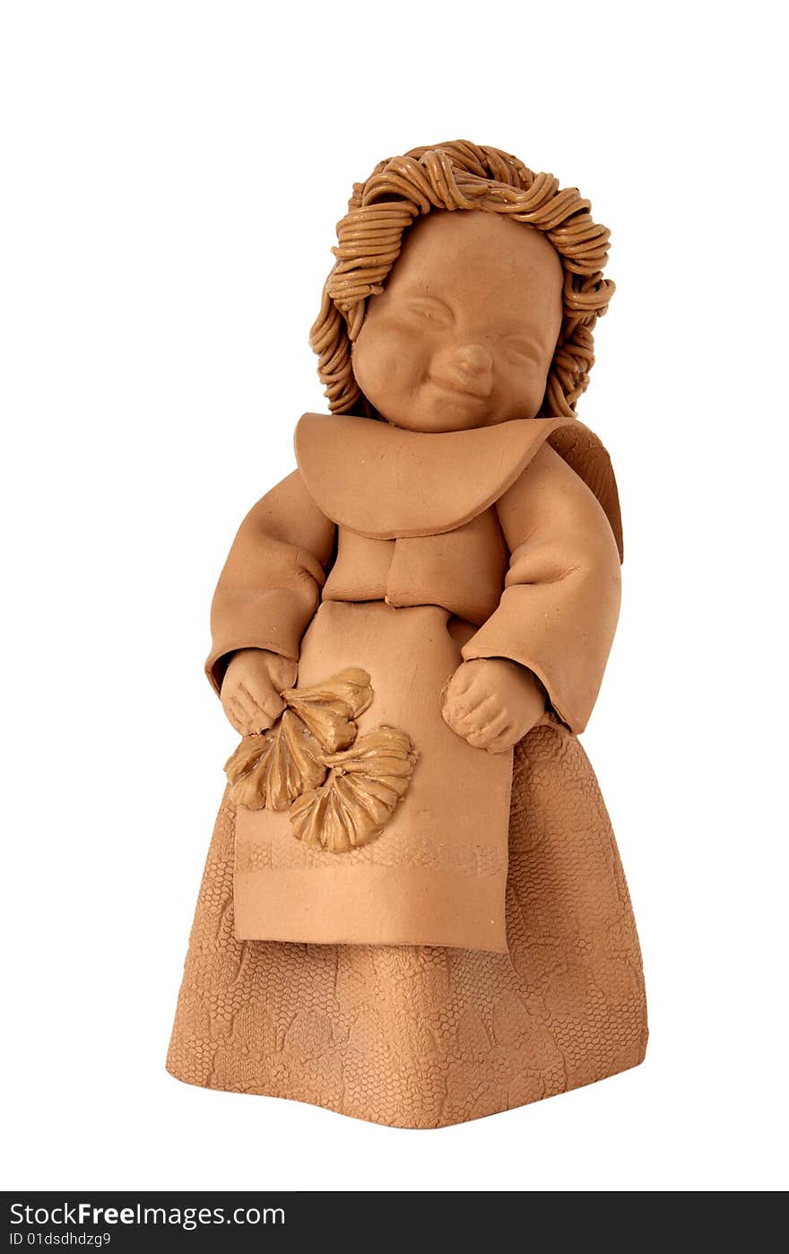 Ceramic brown doll, little girl in traditional dress isolated over white. Ceramic brown doll, little girl in traditional dress isolated over white