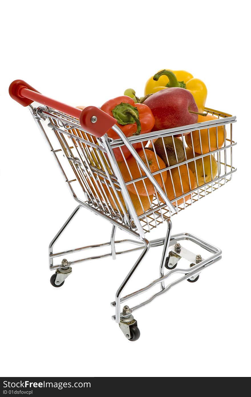 Shopping trolley with fruits and vegetables against a white background