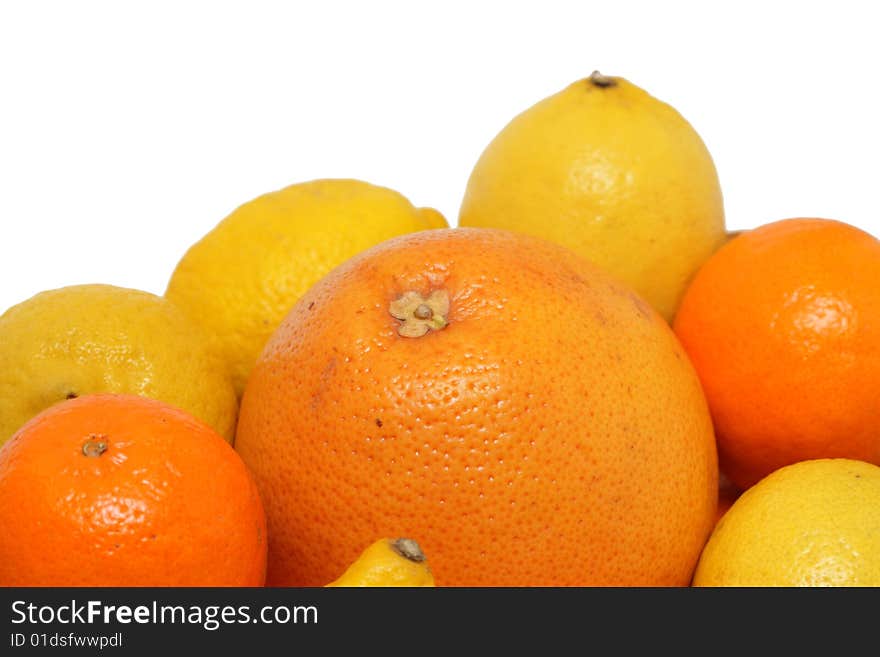 Lemons, oranges, grapefruit isolated on a white background. Lemons, oranges, grapefruit isolated on a white background