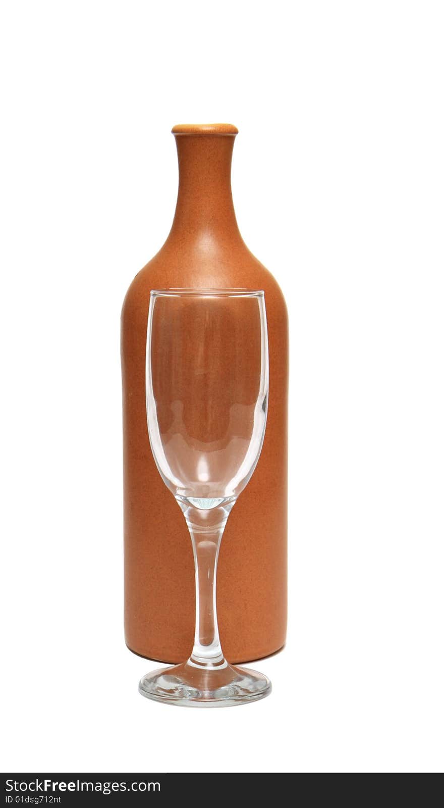 Bottle and empty glass isolated on a white background