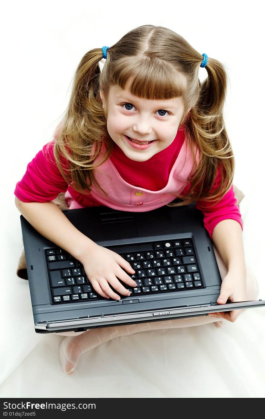 Little girl with laptop