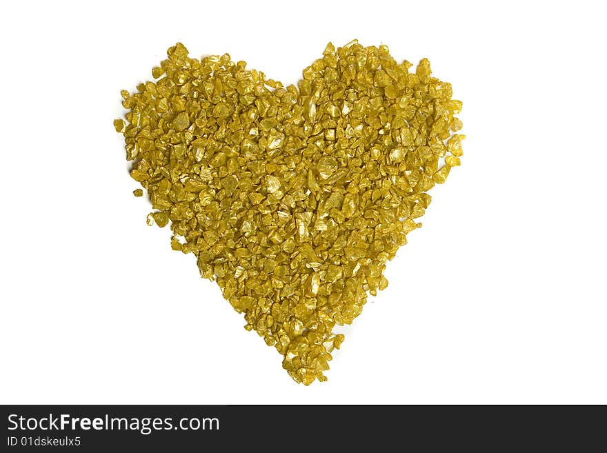 Golden heart made with decorative stones