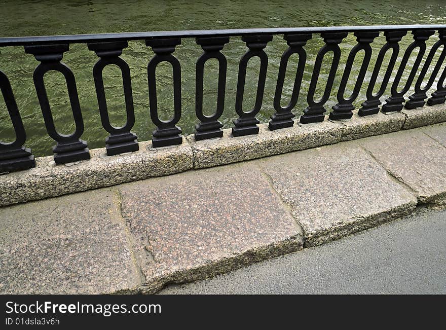 Iron Railings at Moika River Embankment in Saint Petersburg, Russia.