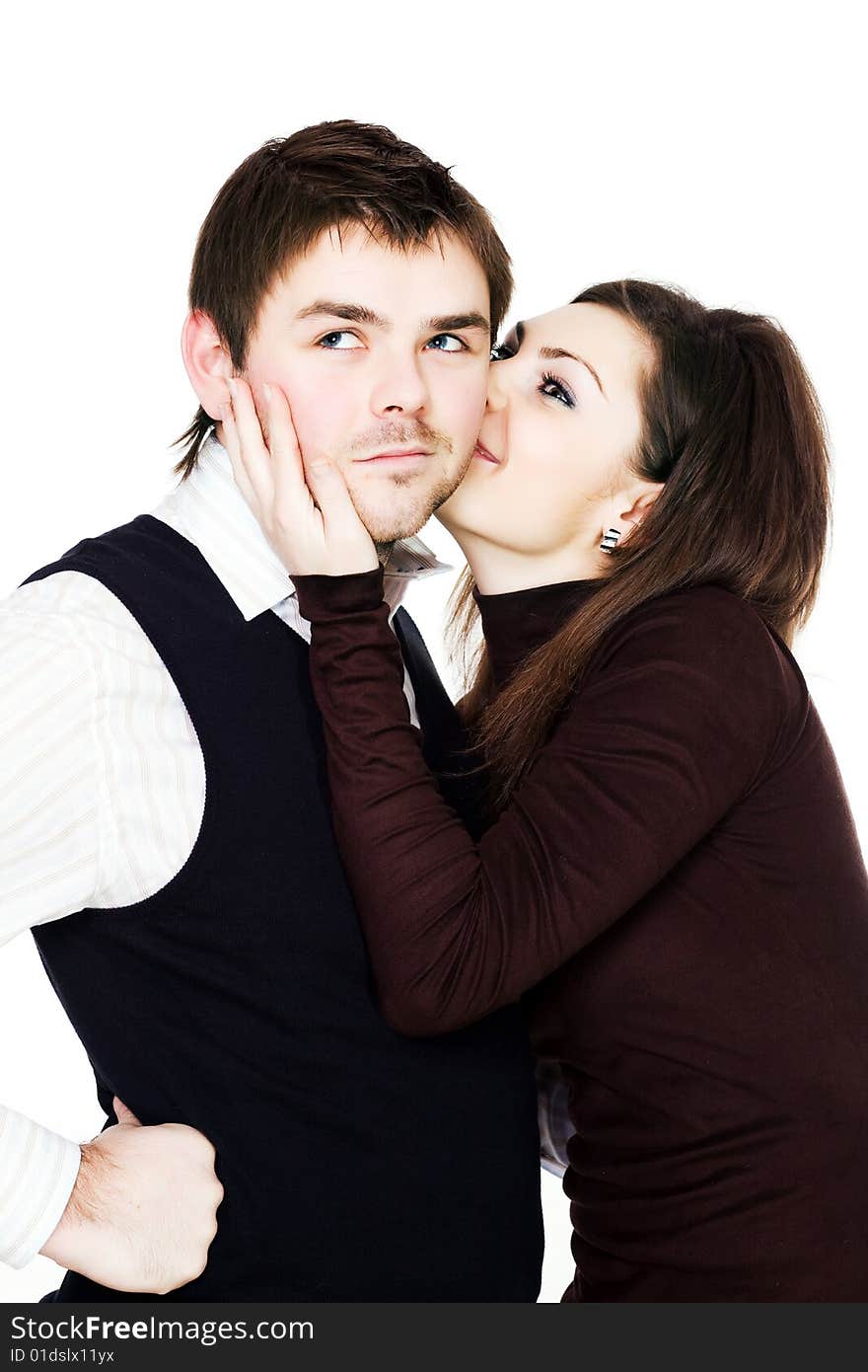 Stock photo: an image of a nice woman kissing a man. Stock photo: an image of a nice woman kissing a man