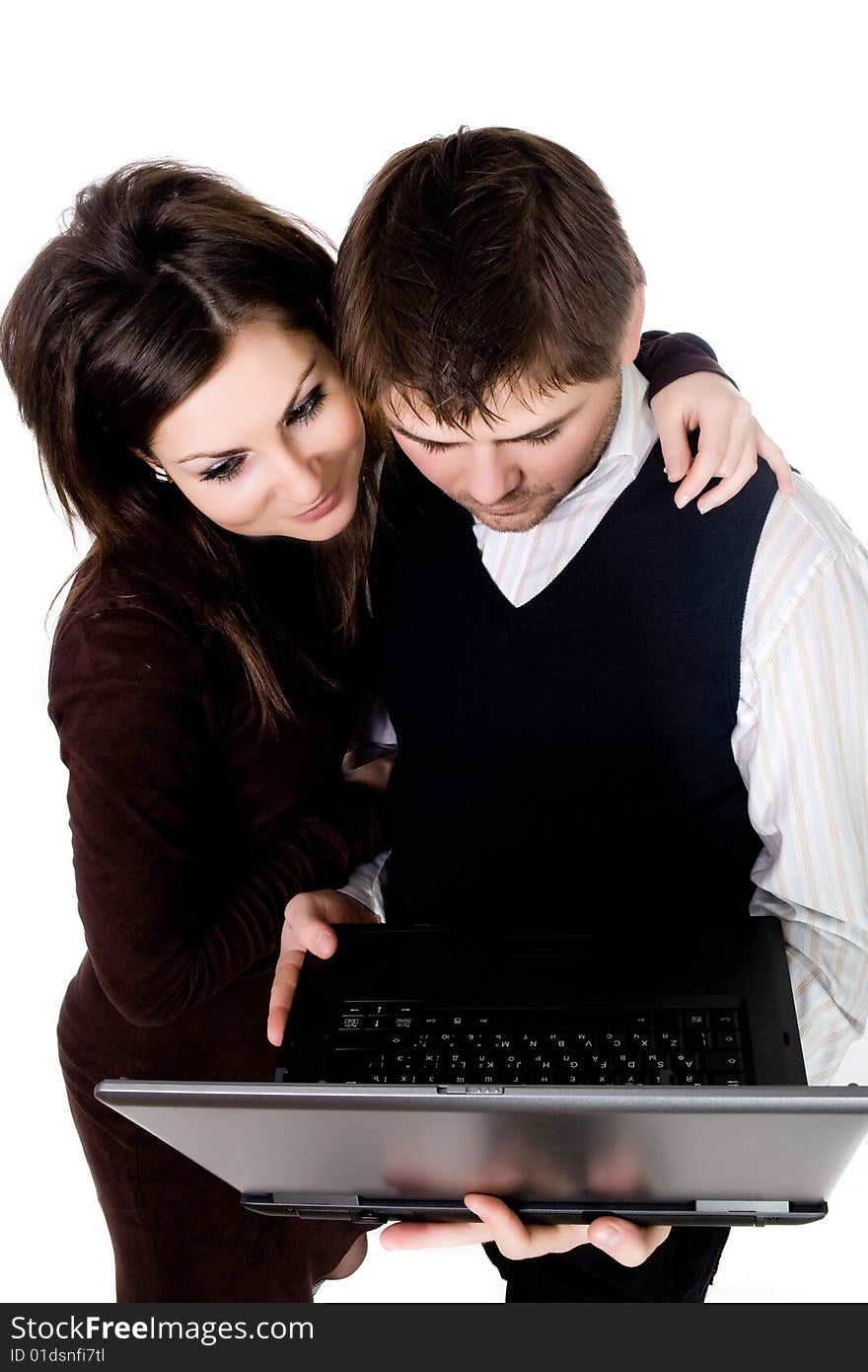 Stock photo: an image of a nice couple with a laptop. Stock photo: an image of a nice couple with a laptop