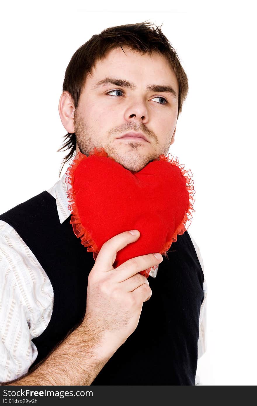 Stock photo: an image of a man with his chin on a red heart. Stock photo: an image of a man with his chin on a red heart