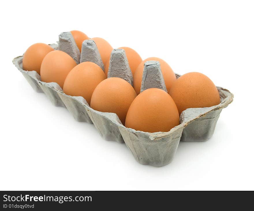 Eggs in a carton on white background