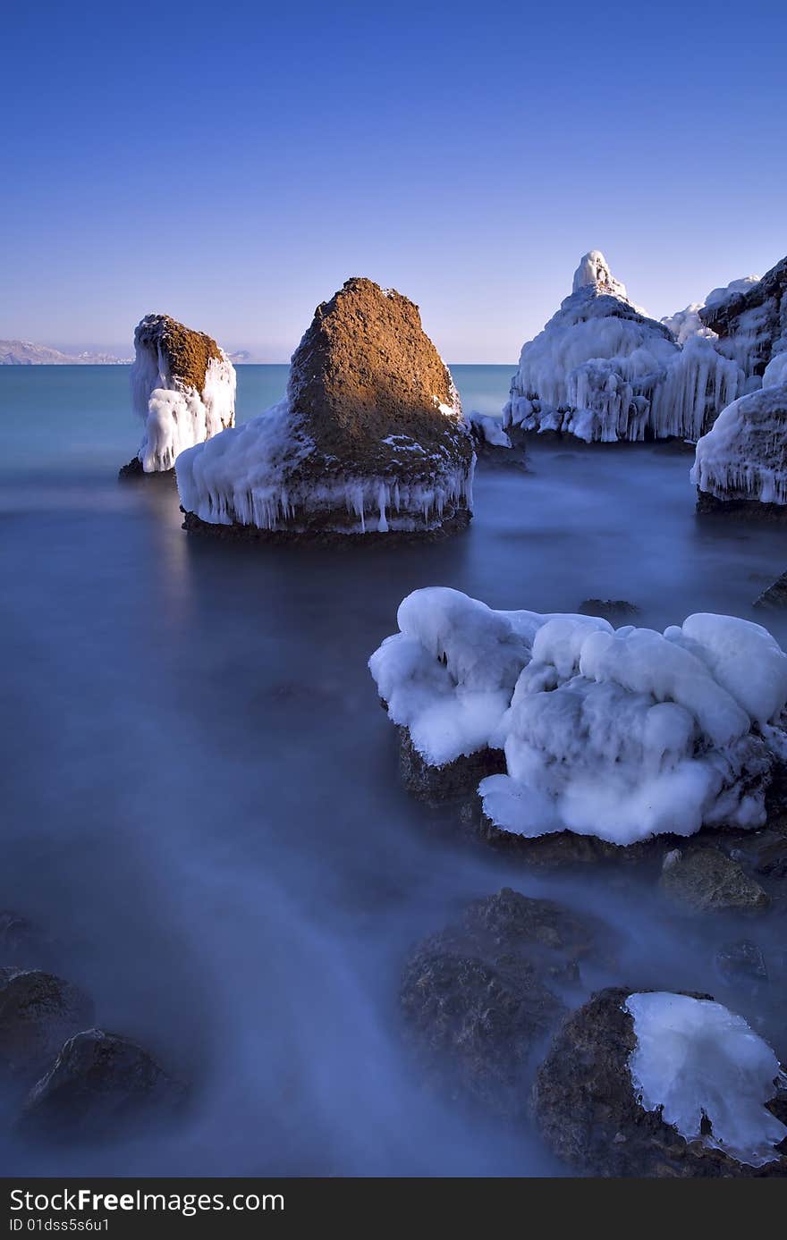 Beautiful long exposure coastal landscape in winter