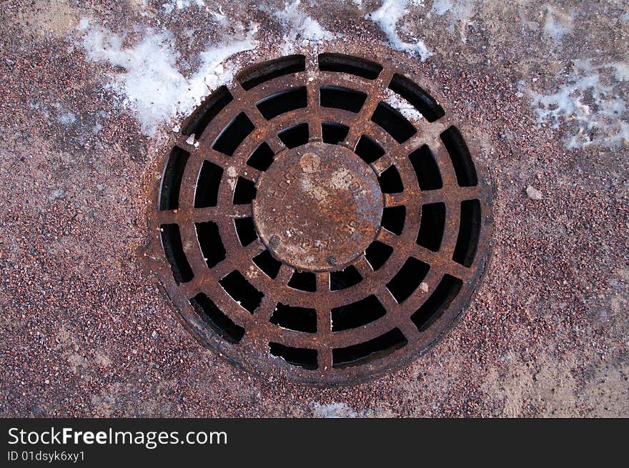 Cast iron manhole cover for background and texture