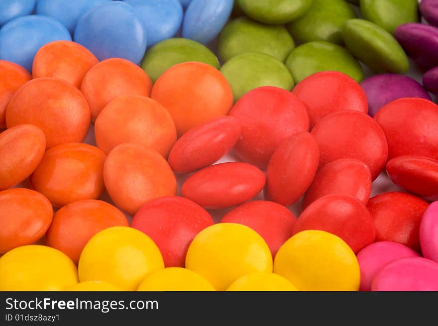 A rainbow of coloured candy. A rainbow of coloured candy