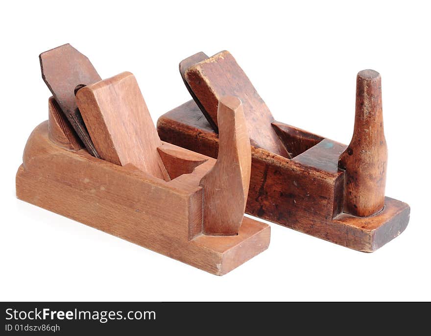 Old wooden planes on a white background