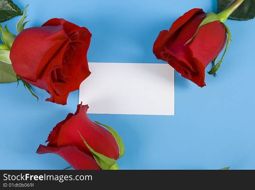 Red three roses around the note