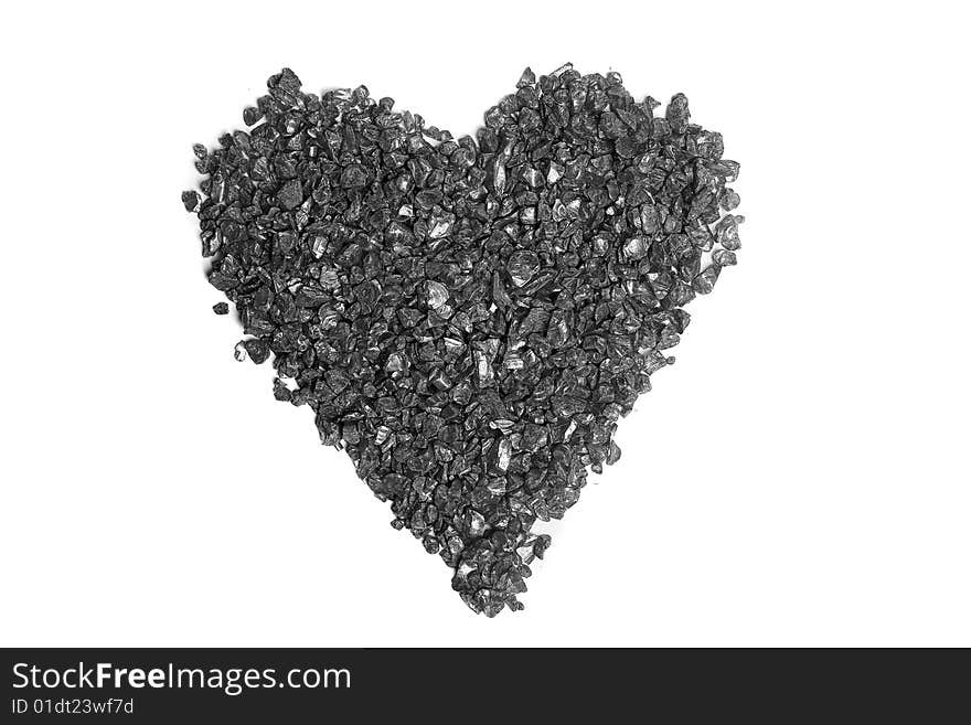 Heart made with black stones