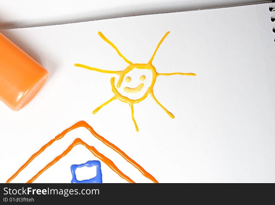 Drawing of the house with sun on paper. Drawing of the house with sun on paper