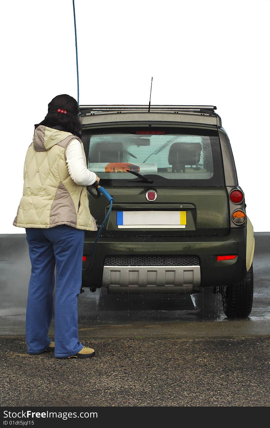 Girl cleaning her car in a cleaning station on a white background