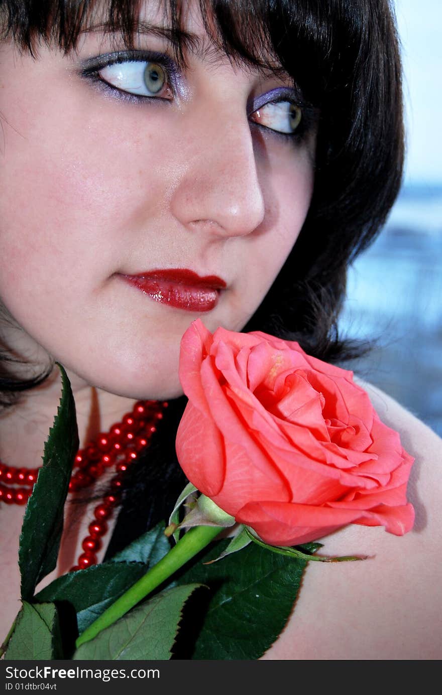 Female Portrait With Red Rose