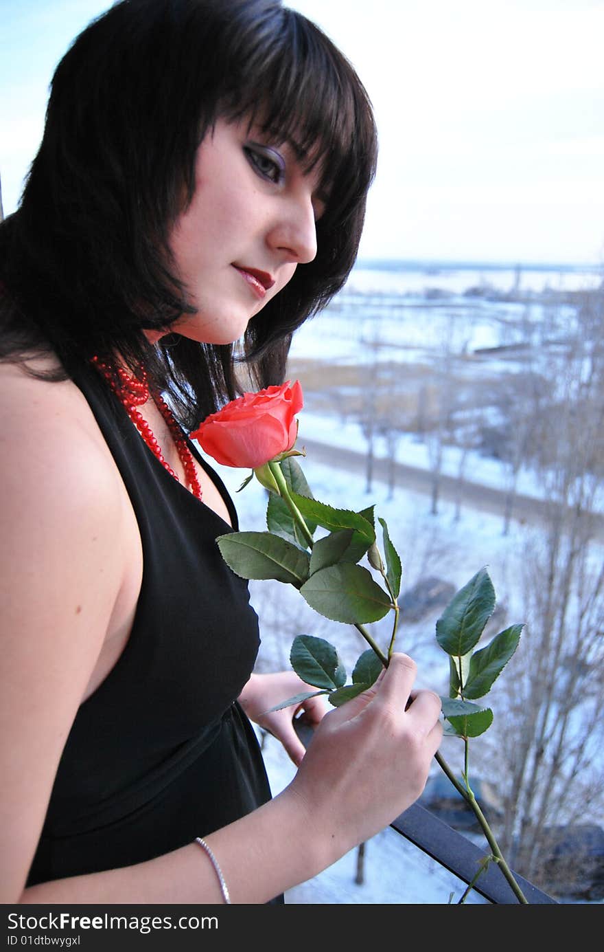 Female Portrait With Red Rose