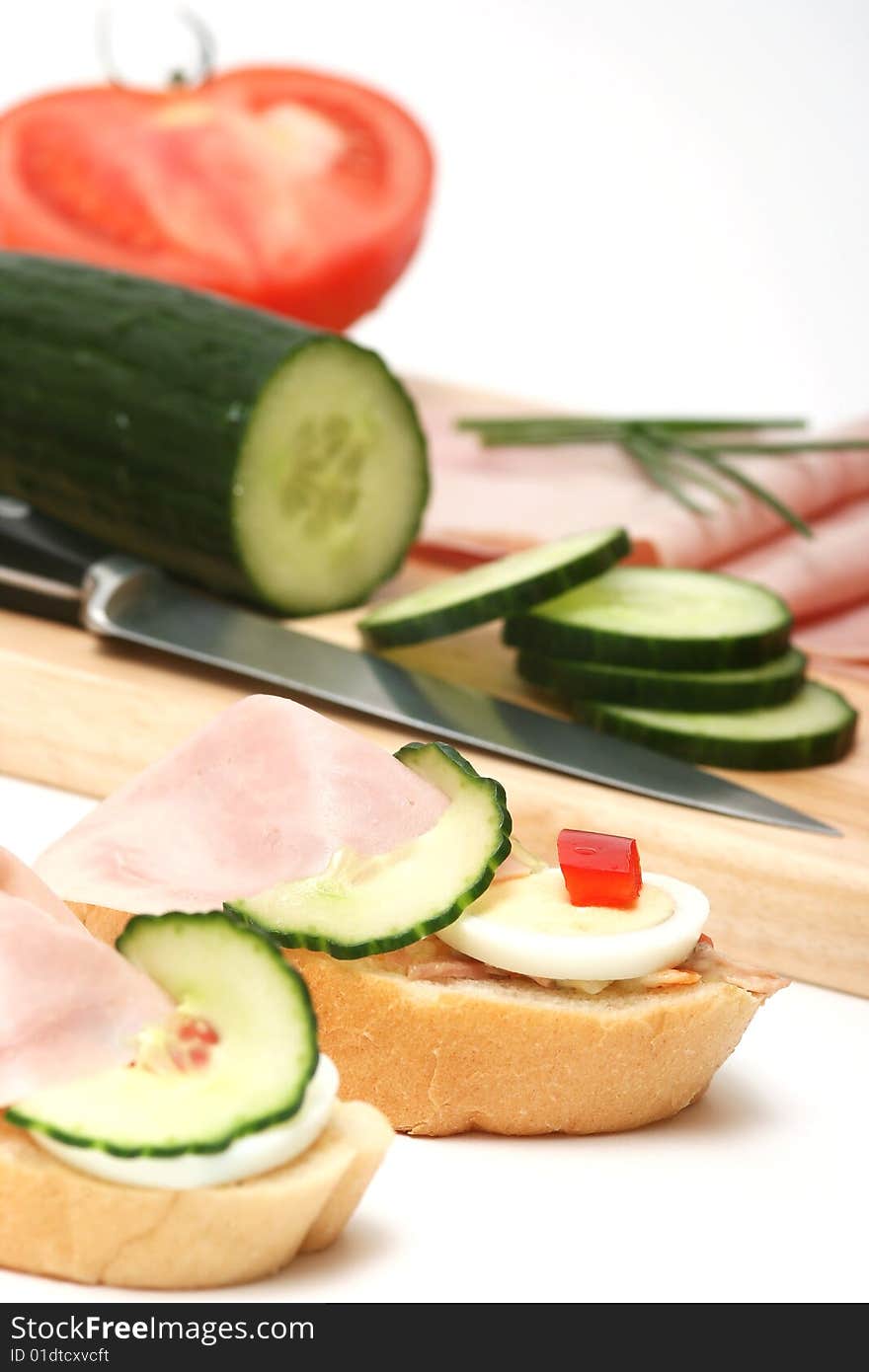 Ham,cucumber,egg and bread for breakfast