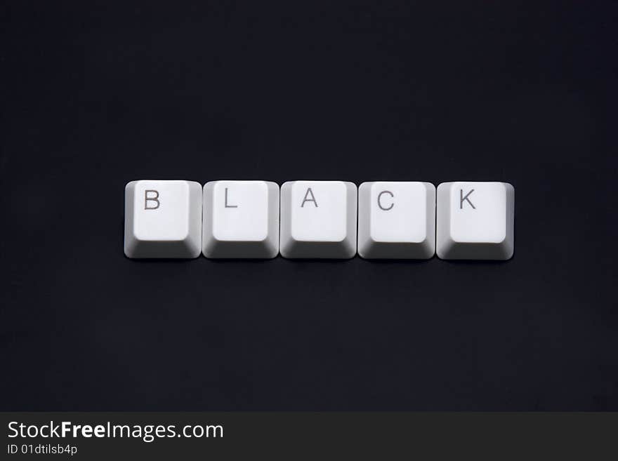 BUSINESS sign made of keyboard keys isolated on black background