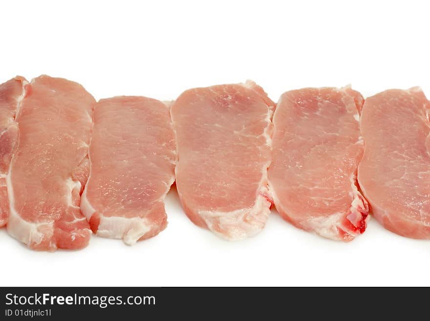 Raw pork meat on bright background