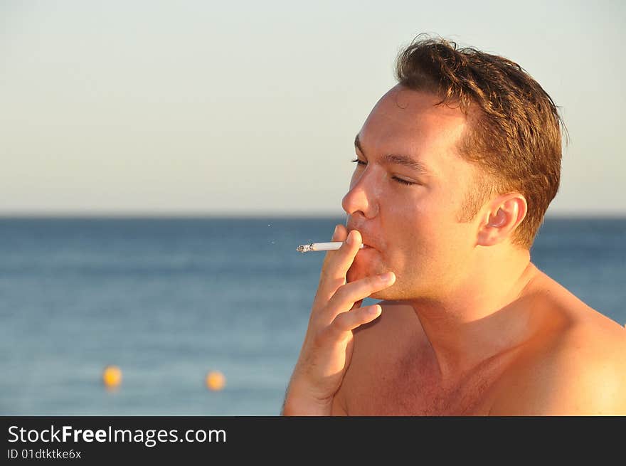 A young man smoking