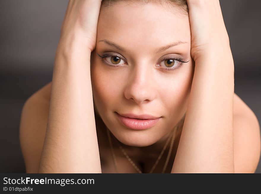 Portrait of attractive girl on black background