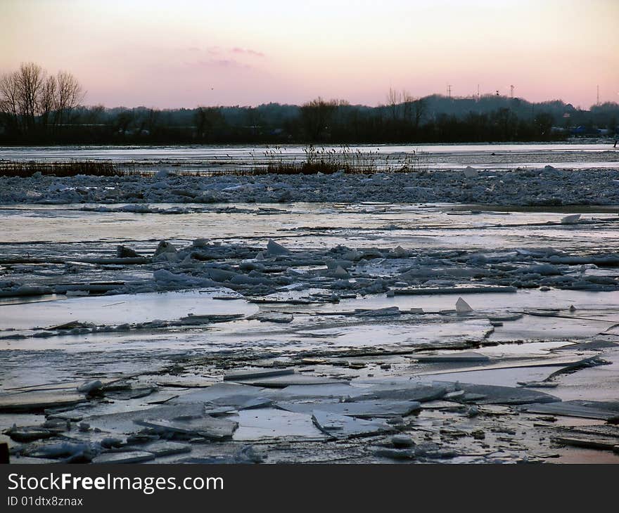 Ice on surface of river, cracked and broken after thaw. Ice on surface of river, cracked and broken after thaw