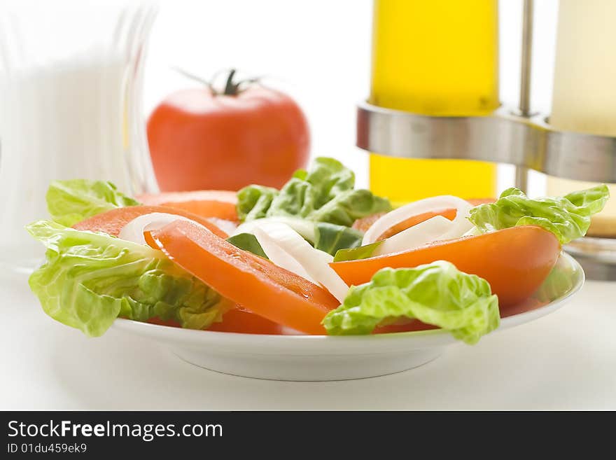 Fresh natural salad bowl tomato lettuce onion