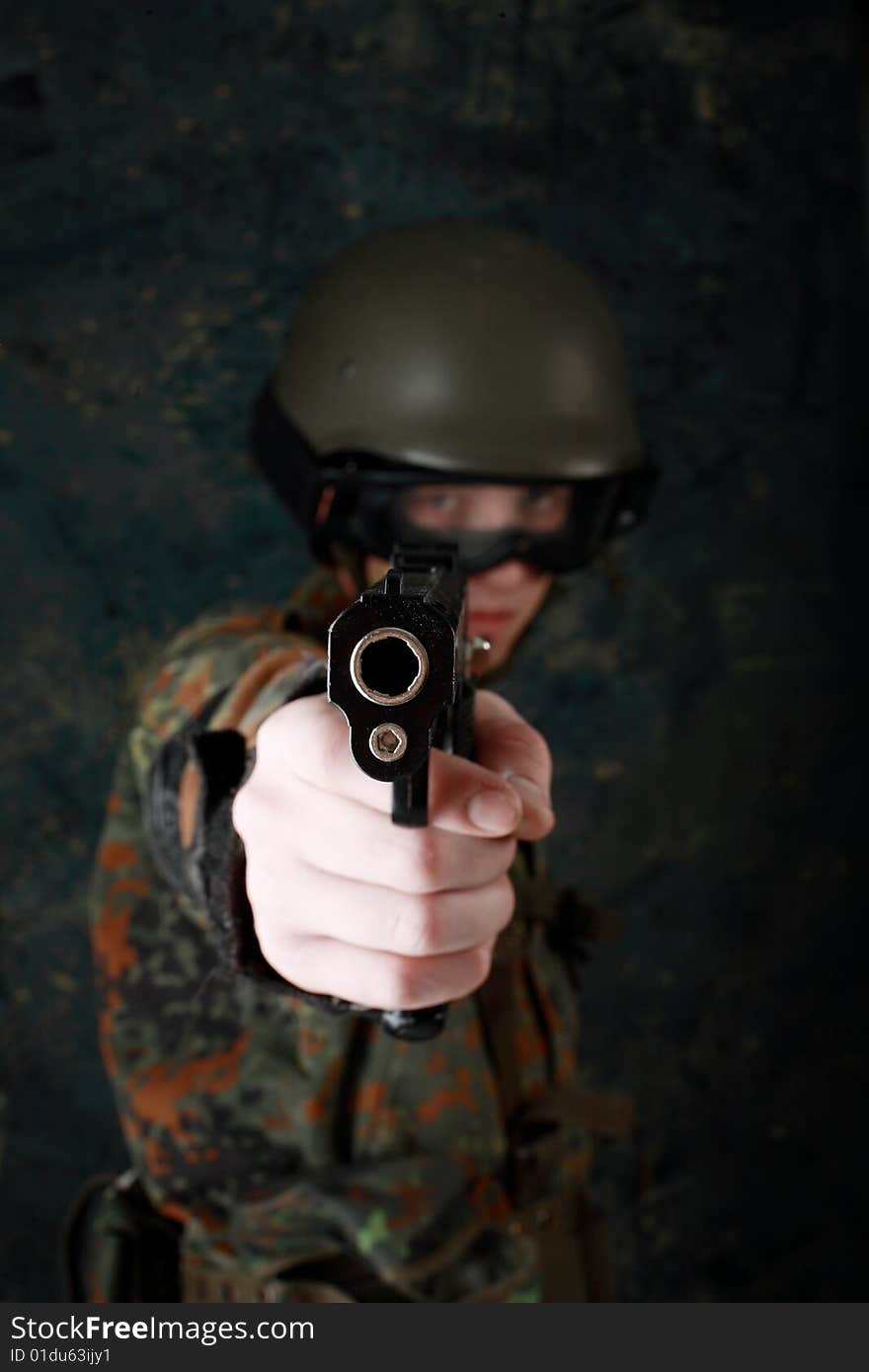 Shot of a soldier holding gun. Shot of a soldier holding gun.