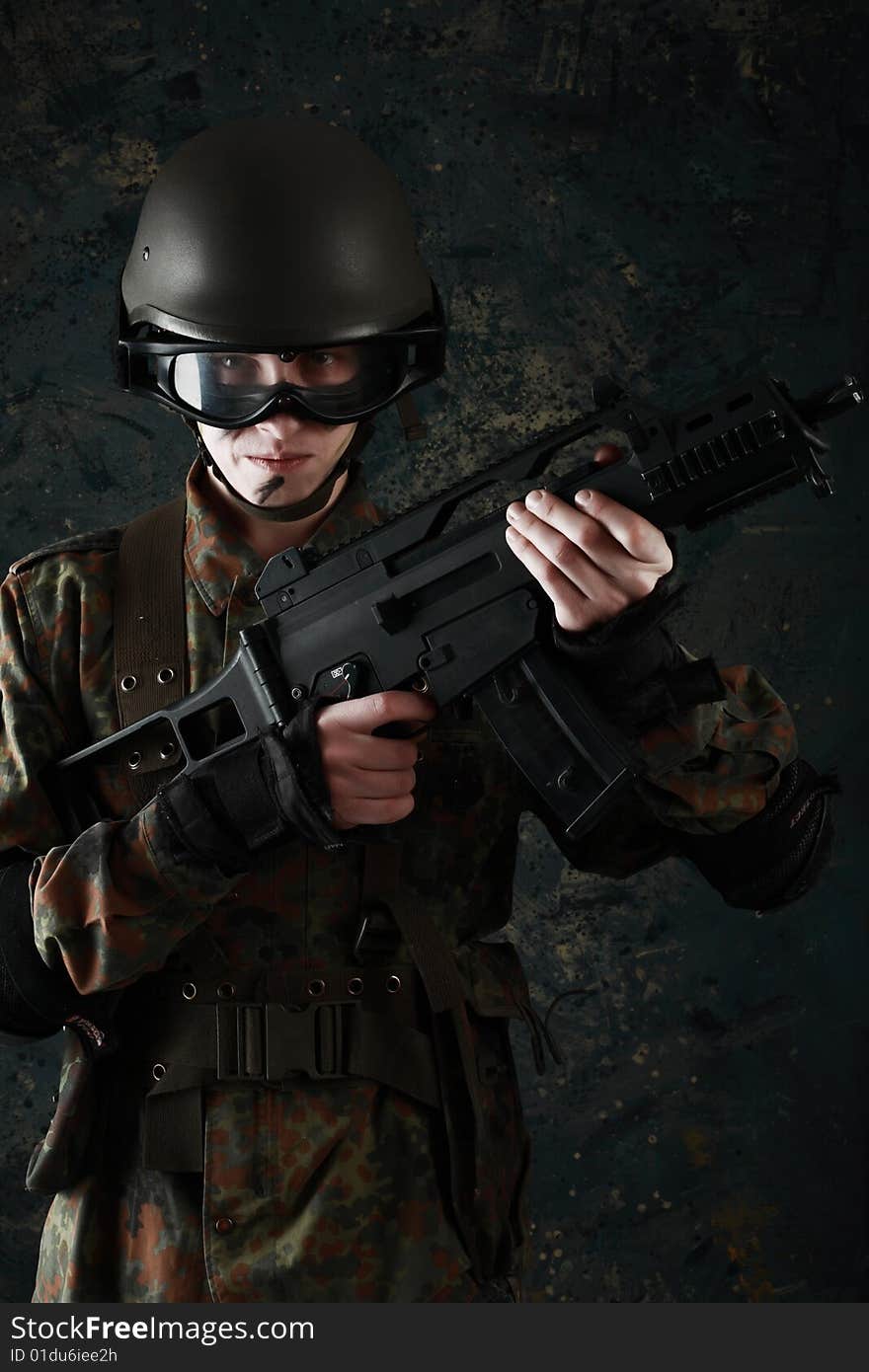 Shot of a soldier holding gun. Shot of a soldier holding gun.